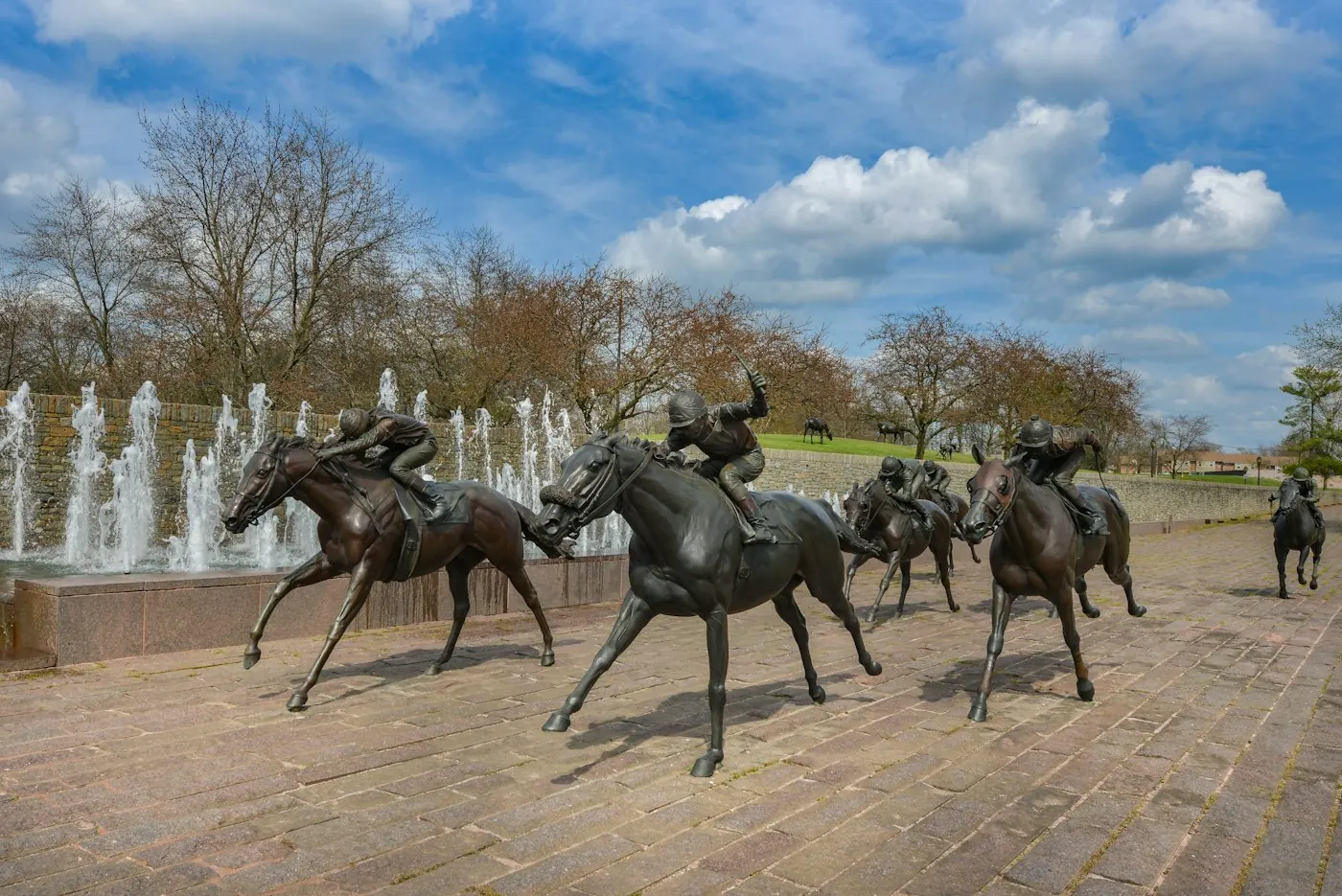 Bronze statues of jockeys riding horses